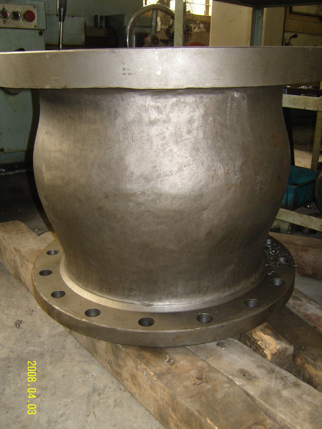 Close-up photo of a tri-clamp connection — ferrules, gasket, clamp visible; showing how the components interface