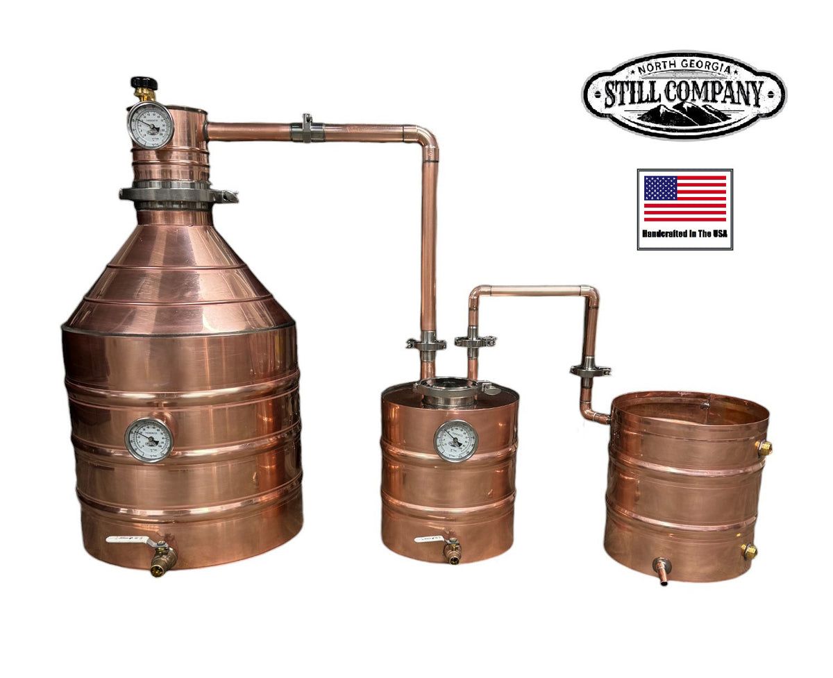 North Georgia Still Company 20-Gallon Distillers Kit — 20 oz / 22-gauge copper throughout boiler, 5-gallon thumper with 4" fruit port, 5-gallon worm with 15 ft copper coil; the production-scale extension of the NG Still kits at smaller sizes used in Vols 3, 4, and 6 (reference only, vendor copyright)