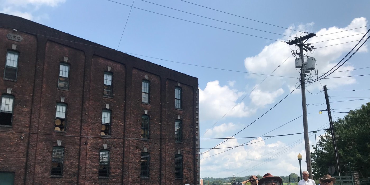 A bonded barrel-aging warehouse (Buffalo Trace Distillery, Kentucky). For aged spirits, the warehouse is often the largest and most distinctive structure on the property — and the inventory inside represents the bulk of the distillery's working capital. Federal bond requirements and state insurance regulations both apply